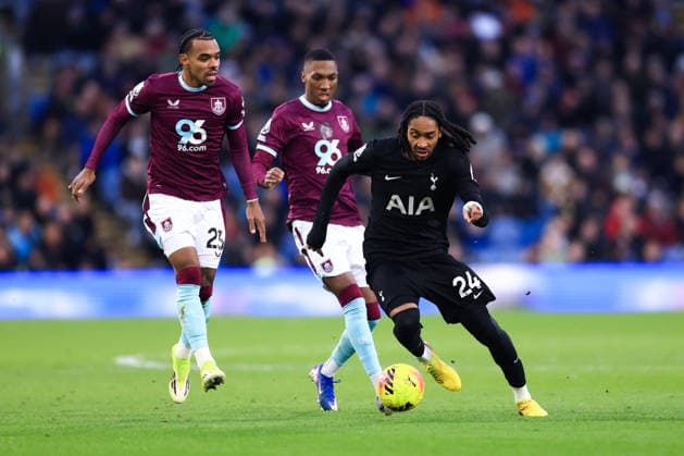 Burnley, England, 24th January 2026. Djed Spence of Tottenham Hotspur is challenged by Lucas Pires (L) and Jaidon Anthony of Burnley during the Burnley vs Tottenham Hotspur Premier League match at Turf Moor, Burnley. Picture credit should read: Jessica Hornby Sportimage EDITORIAL USE ONLY. No use with unauthorised audio, video, data, fixture lists, club league logos or live services. Online in-match use limited to 120 images, no video emulation. No use in betting, games or single club league player publications. SPI_062_JH_BURNLEY_TOTTENHAM SPI-4474-0061