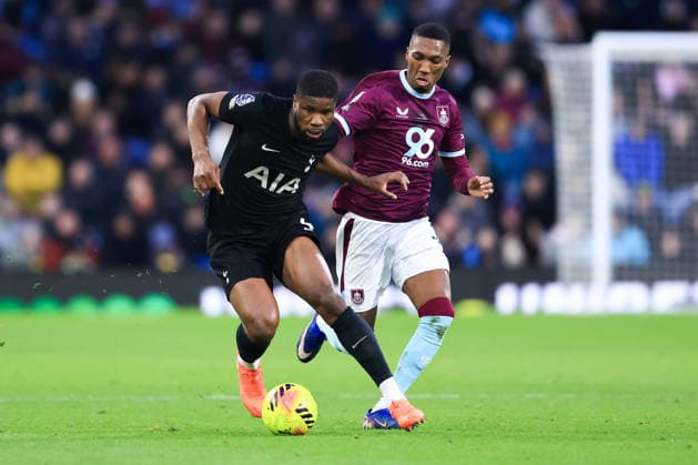 Burnley, England, 24th January 2026. Kevin Danso of Tottenham Hotspur is challenged by Jaidon Anthony of Burnley during the Burnley vs Tottenham Hotspur Premier League match at Turf Moor, Burnley. Picture credit should read: Jessica Hornby Sportimage EDITORIAL USE ONLY. No use with unauthorised audio, video, data, fixture lists, club league logos or live services. Online in-match use limited to 120 images, no video emulation. No use in betting, games or single club league player publications. SPI_088_JH_BURNLEY_TOTTENHAM SPI-4474-0087