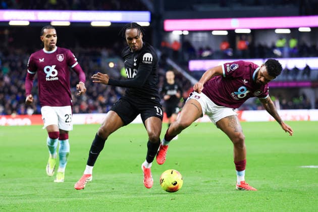 Burnley, England, 24th January 2026. Mathys Tel of Tottenham Hotspur battles for possession with Lyle Foster of Burnley during the Burnley vs Tottenham Hotspur Premier League match at Turf Moor, Burnley. Picture credit should read: Jessica Hornby Sportimage EDITORIAL USE ONLY. No use with unauthorised audio, video, data, fixture lists, club league logos or live services. Online in-match use limited to 120 images, no video emulation. No use in betting, games or single club league player publications. SPI_094_JH_BURNLEY_TOTTENHAM SPI-4474-0093