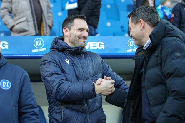 Herzliches Hallo zwischen Mario Eggimann (Karlsruher SC, Geschaeftsfuehrer und Benjamin Weber (Hertha BSC, Sportdirektor) , Karlsruher SC vs. Hertha BSC, 2. Bundesliga, 19. Spieltag, 2025 2026, 24.01.2026, DFL REGULATIONS PROHIBIT ANY USE OF PHOTOGRAPHS AS IMAGE SEQUENCES AND OR QUASI-VIDEO, Karlsruher SC vs. Hertha BSC, 2. Bundesliga, 19. Spieltag, 2025 2026, 24.01.2026 Karlsruhe