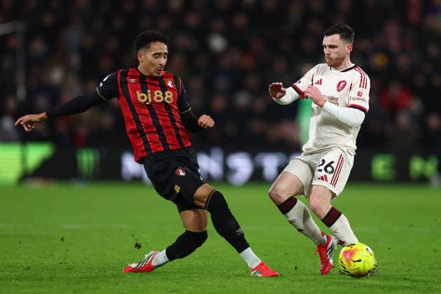 Bournemouth, England, 24th January 2026. Amine Adli of Bournemouth and Andrew Robertson of Liverpool challenge for the ball during the AFC Bournemouth vs Liverpool Premier League match at the Vitality Stadium, Bournemouth. Picture credit should read: Paul Terry Sportimage EDITORIAL USE ONLY. No use with unauthorised audio, video, data, fixture lists, club league logos or live services. Online in-match use limited to 120 images, no video emulation. No use in betting, games or single club league player publications. SPI_074_PT_Bournemouth_Liverpool SPI-4475-0074