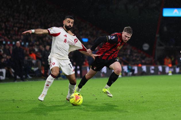 Football - 2025 2026 Premier League - AFC Bournemouth vs Liverpool - Vitality Stadium - Saturday 24th January 2026 Adrien Truffert of Bournemouth grabs Mohamed Salah of Liverpool shirt during the Premier League match at the Vitality Stadium COLORSPORT Shaun Boggust 