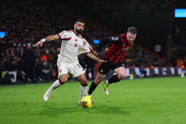 Football - 2025 2026 Premier League - AFC Bournemouth vs Liverpool - Vitality Stadium - Saturday 24th January 2026 Adrien Truffert of Bournemouth grabs Mohamed Salah of Liverpool shirt during the Premier League match at the Vitality Stadium COLORSPORT Shaun Boggust 