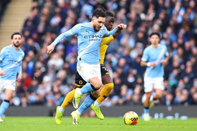 Manchester City v Wolverhampton Wanderers, Premier League Rayan Cherki of Manchester City is challenged for possession by Mateus Mane of Wolverhampton Wanderers during the Manchester City v Wolverhampton Wanderers Premier League match at the Etihad Stadium, Manchester, England on 24 January 2026 Credit: Ryan Crockett Every Second Media Editorial use only. All images are copyright Every Second Media Limited. No images may be reproduced without prior permission. All rights reserved. Premier League and Football League images are subject to licensing agreements with Football DataCo Limited. see https: www.football-dataco.com Copyright: xIMAGO EveryxSecondxMediax ESM-1769-0194 RyanxCrockettx xEveryxSecondxMediax