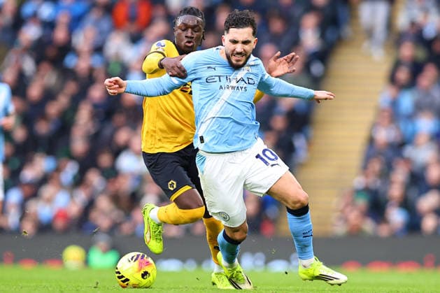 Manchester City v Wolverhampton Wanderers, Premier League Rayan Cherki of Manchester City is challenged for possession by Mateus Mane of Wolverhampton Wanderers during the Manchester City v Wolverhampton Wanderers Premier League match at the Etihad Stadium, Manchester, England on 24 January 2026 Credit: Ryan Crockett Every Second Media Editorial use only. All images are copyright Every Second Media Limited. No images may be reproduced without prior permission. All rights reserved. Premier League and Football League images are subject to licensing agreements with Football DataCo Limited. see https: www.football-dataco.com Copyright: xIMAGO EveryxSecondxMediax ESM-1769-0196 RyanxCrockettx xEveryxSecondxMediax