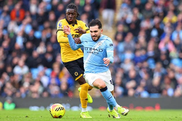 Manchester City v Wolverhampton Wanderers, Premier League Rayan Cherki of Manchester City is challenged for possession by Mateus Mane of Wolverhampton Wanderers during the Manchester City v Wolverhampton Wanderers Premier League match at the Etihad Stadium, Manchester, England on 24 January 2026 Credit: Ryan Crockett Every Second Media Editorial use only. All images are copyright Every Second Media Limited. No images may be reproduced without prior permission. All rights reserved. Premier League and Football League images are subject to licensing agreements with Football DataCo Limited. see https: www.football-dataco.com Copyright: xIMAGO EveryxSecondxMediax ESM-1769-0197 RyanxCrockettx xEveryxSecondxMediax