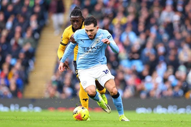 Manchester City v Wolverhampton Wanderers, Premier League Rayan Cherki of Manchester City is challenged for possession by Mateus Mane of Wolverhampton Wanderers during the Manchester City v Wolverhampton Wanderers Premier League match at the Etihad Stadium, Manchester, England on 24 January 2026 Credit: Ryan Crockett Every Second Media Editorial use only. All images are copyright Every Second Media Limited. No images may be reproduced without prior permission. All rights reserved. Premier League and Football League images are subject to licensing agreements with Football DataCo Limited. see https: www.football-dataco.com Copyright: xIMAGO EveryxSecondxMediax ESM-1769-0198 RyanxCrockettx xEveryxSecondxMediax