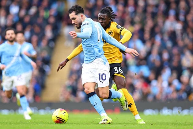 Manchester City v Wolverhampton Wanderers, Premier League Rayan Cherki of Manchester City is challenged for possession by Mateus Mane of Wolverhampton Wanderers during the Manchester City v Wolverhampton Wanderers Premier League match at the Etihad Stadium, Manchester, England on 24 January 2026 Credit: Ryan Crockett Every Second Media Editorial use only. All images are copyright Every Second Media Limited. No images may be reproduced without prior permission. All rights reserved. Premier League and Football League images are subject to licensing agreements with Football DataCo Limited. see https: www.football-dataco.com Copyright: xIMAGO EveryxSecondxMediax ESM-1769-0199 RyanxCrockettx xEveryxSecondxMediax