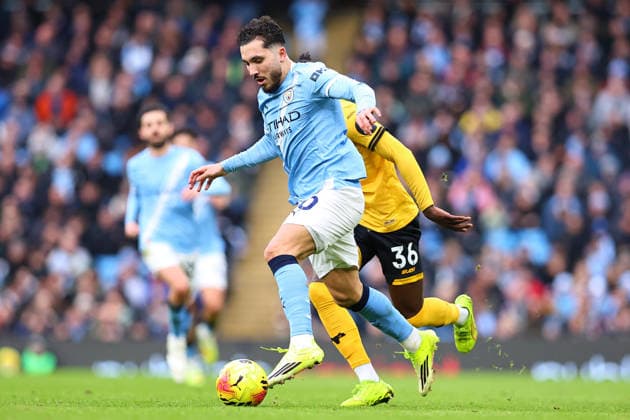 Manchester City v Wolverhampton Wanderers, Premier League Rayan Cherki of Manchester City is challenged for possession by Mateus Mane of Wolverhampton Wanderers during the Manchester City v Wolverhampton Wanderers Premier League match at the Etihad Stadium, Manchester, England on 24 January 2026 Credit: Ryan Crockett Every Second Media Editorial use only. All images are copyright Every Second Media Limited. No images may be reproduced without prior permission. All rights reserved. Premier League and Football League images are subject to licensing agreements with Football DataCo Limited. see https: www.football-dataco.com Copyright: xIMAGO EveryxSecondxMediax ESM-1769-0200 RyanxCrockettx xEveryxSecondxMediax