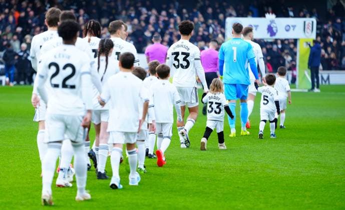 Antonee Robinson of Fulham walks out with his daughter, Atlas Fulham v Brighton and Hove Albion, Premier League, Football, Craven Cottage, London, UK - 24 Jan 2026London Craven Cottage United Kingdom EDITORIAL USE ONLY No use with unauthorised audio, video, data, fixture lists, club league logos or live services. Online in-match use limited to 120 images, no video emulation. No use in betting, games or single club league player publications. Copyright: xJavierxGarcia Shutterstockx 16425974ey