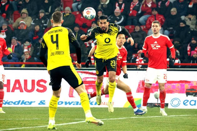 DEU, DFL, 1. FBL, 1.FC Union vs. Borussia Dortmund, 24.01.2026, Stadion Alte Foersterei, Berlin, DEU, DFL, 1. FBL, 1.FC Union vs. Borussia Dortmund, im Bild: Wooyeong Jeong (1.FC Union Berlin 11), Andrej Ilic (1.FC Union Berlin 23), Emre Can (Borussia Dortmund 23) DFL - regulations prohibit any use of Photographs as image sequences and or quasi-video