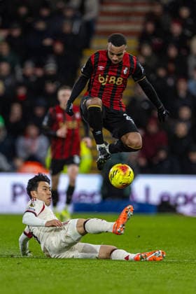 (260125) -- BOURNEMOUTH, Jan. 25, 2026 () -- Liverpool s Wataru Endo (Below) challenges Bournemouth s Eli Junior Kroupi during the English Premier League match between Bournemouth and Liverpool in Bournemouth, Britain, on Jan. 24, 2026. () FOR EDITORIAL USE ONLY. NOT FOR SALE FOR MARKETING OR ADVERTISING CAMPAIGNS. NO USE WITH UNAUTHORIZED AUDIO, VIDEO, DATA, FIXTURE LISTS, CLUB LEAGUE LOGOS OR LIVE SERVICES. ONLINE IN-MATCH USE LIMITED TO 45 IMAGES, NO VIDEO EMULATION. NO USE IN BETTING, GAMES OR SINGLE CLUB LEAGUE PLAYER PUBLICATIONS. (SP)BRITAIN-BOURNEMOUTH-FOOTBALL-PREMIER LEAGUE-BOURNEMOUT VS LIVERPOOL Xinhua 