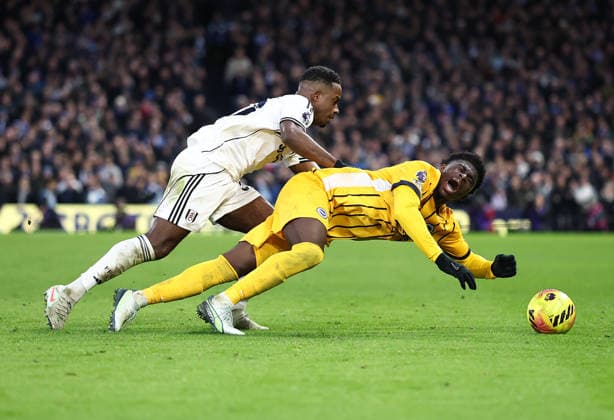 London, England, 24th January 2026. Ryan Sessegnon of Fulham with Yankuba Minteh of Brighton during the Fulham vs Brighton and Hove Albion Premier League match at Craven Cottage, London. Picture credit should read: David Klein Sportimage EDITORIAL USE ONLY. No use with unauthorised audio, video, data, fixture lists, club league logos or live services. Online in-match use limited to 120 images, no video emulation. No use in betting, games or single club league player publications. SPI_005_DK_FULHAM_BRIGHTON SPI-4482-0005