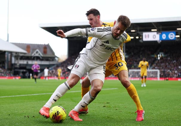 London, England, 24th January 2026. Joachim Andersen of Fulham with Pascal Groß of Brighton during the Fulham vs Brighton and Hove Albion Premier League match at Craven Cottage, London. Picture credit should read: David Klein Sportimage EDITORIAL USE ONLY. No use with unauthorised audio, video, data, fixture lists, club league logos or live services. Online in-match use limited to 120 images, no video emulation. No use in betting, games or single club league player publications. SPI_012_DK_FULHAM_BRIGHTON SPI-4482-0086