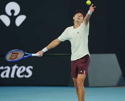 (260125) -- MELBOURNE, Jan. 25, 2026 -- Alex de Minaur serves during the men s singles 4th round match between Alex de Minaur of Australia and Alexander Bublik of Kazakhstan at the Australian Open tennis tournament in Melbourne, Australia, Jan. 25, 2026. (Photo by Xinhua) (SP)AUSTRALIA-MELBOURNE-TENNIS-AUSTRALIAN OPEN-MEN S SINGLES WangxShen 