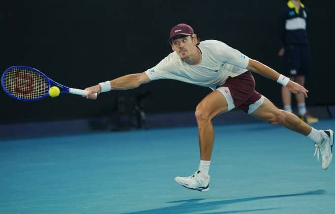 (260125) -- MELBOURNE, Jan. 25, 2026 -- Alex de Minaur hits a return during the men s singles 4th round match between Alex de Minaur of Australia and Alexander Bublik of Kazakhstan at the Australian Open tennis tournament in Melbourne, Australia, Jan. 25, 2026. (Photo by Xinhua) (SP)AUSTRALIA-MELBOURNE-TENNIS-AUSTRALIAN OPEN-MEN S SINGLES WangxShen 