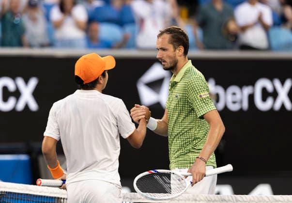 (260125) -- MELBOURNE, Jan. 25, 2026 -- Daniil Medvedev (R) shakes hands with Learner Tien after the men s singles 4th round match between Daniil Medvedev of Russia and Learner Tien of the United States at the Australian Open tennis tournament in Melbourne, Australia, Jan. 25, 2026. (Photo by Xinhua) (SP)AUSTRALIA-MELBOURNE-TENNIS-AUSTRALIAN OPEN-MEN S SINGLES HuxJingchen 