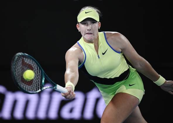 (260125) -- MELBOURNE, Jan. 25, 2026 -- Mirra Andreeva hits a return during the women s singles 4th round match between Elina Svitolina of Ukraine and Mirra Andreeva of Russia at the Australian Open tennis tournament in Melbourne, Australia, Jan. 25, 2026. (Photo by Xinhua) (SP)AUSTRALIA-MELBOURNE-TENNIS-AUSTRALIAN OPEN-WOMEN S SINGLES WangxShen 
