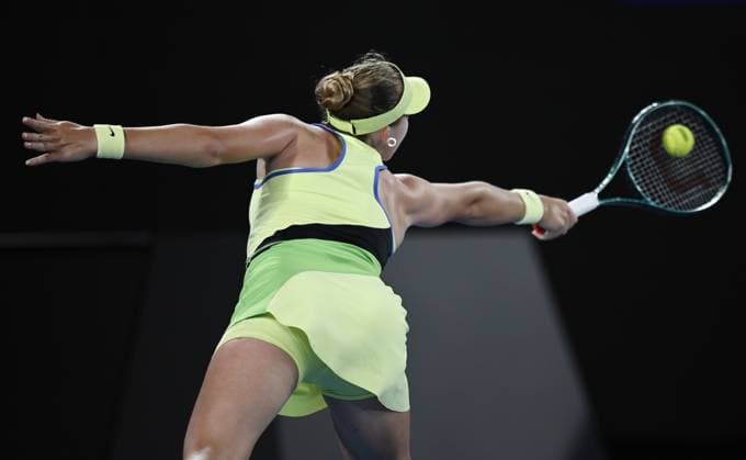(260125) -- MELBOURNE, Jan. 25, 2026 -- Mirra Andreeva hits a return during the women s singles 4th round match between Elina Svitolina of Ukraine and Mirra Andreeva of Russia at the Australian Open tennis tournament in Melbourne, Australia, Jan. 25, 2026. (Photo by Xinhua) (SP)AUSTRALIA-MELBOURNE-TENNIS-AUSTRALIAN OPEN-WOMEN S SINGLES WangxShen 
