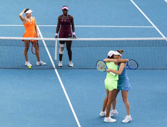 (260125) -- MELBOURNE, Jan. 25, 2026 -- Elise Mertens (front R) Zhang Shuai (front L) celebrate winning the women s doubles 2nd round match between Elise Mertens (Belgium) Zhang Shuai (China) and Iva Jovic (the United States) Victoria Mboko (Canada) at the Australian Open tennis tournament in Melbourne, Australia, Jan. 25, 2026. (Photo by Xinhua) (SP)AUSTRALIA-MELBOURNE-TENNIS-AUSTRALIAN OPEN-WOMEN S DOUBLES HuxJingchen 