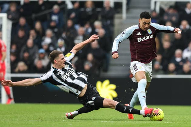 Newcastle Upon Tyne, England, 25th January 2026. Sven Botman of Newcastle United tackles Morgan Rogers of Aston Villa during the Newcastle United vs Aston Villa Premier League match at St. James Park, Newcastle Upon Tyne. Picture credit should read: Nigel Roddis Sportimage EDITORIAL USE ONLY. No use with unauthorised audio, video, data, fixture lists, club league logos or live services. Online in-match use limited to 120 images, no video emulation. No use in betting, games or single club league player publications. SPI_020_NR_NEW_vs_AVL SPI-4479-0020