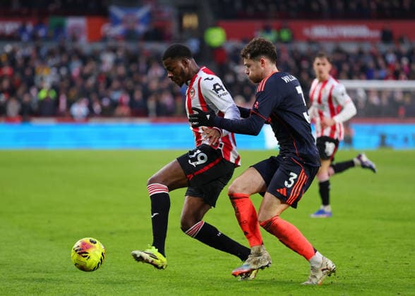 25th January 2026; Gtech Community Stadium, Brentford, London, England; Premier League Football, Brentford versus Nottingham Forest; Dango Ouattara of Brentford under pressure from Neco Williams of Nottingham Forest  JohnxPatrickxFletcher