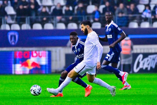 FOOTBALL : Paris FC vs Angers - Ligue 1 - 25 01 2026 Hamari Traore ( 14 - PFC ) and Amine Sbai ( 7 - Angers ) during the Ligue 1 match between Paris FC and Angers SCO at Stade Jean Bouin on January 25, 2026 in Paris, France. ( Photo by Federico Pestellini PsnewZ ) - ParisFrance  Copyright: xFedericoxPestellinix