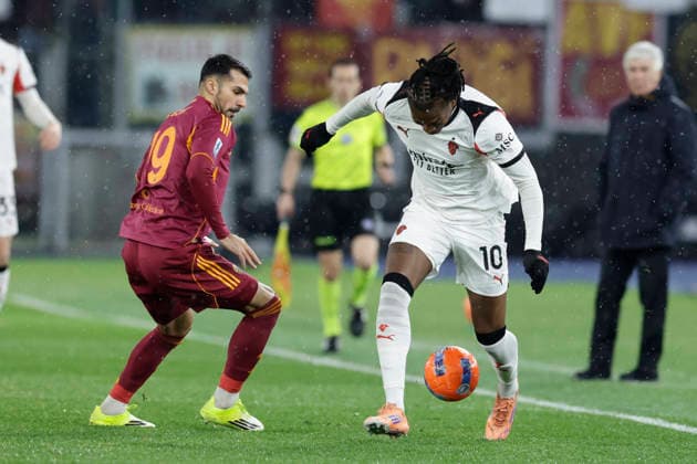 Serie A football match AS Roma and AC Milan Roma™s Turkish defender Zeki Celik challenges for the ball with Milan™s Portuguese forward Rafael Leao during the Serie A football match between AS Roma and AC Milan at Stadio Olimpico on January 25, 2026 in Rome _BPH2126 Copyright: xAntonioxBalascox