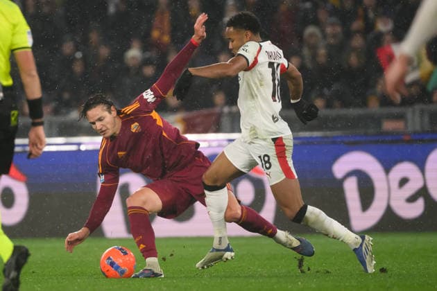 Daniele Ghilardi of AS Roma and Christopher Nkunku of AC Milan during the Serie A 2025 2026 football match between AS Roma and AC Milan at Stadio Olimpico in Rome (Italy), January 25, 2026. AndreaxStaccioli