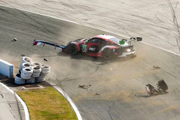 DAYTONA BEACH, FL - DAYTONA BEACH, FL - JANUARY 24 Eric Zitza Jan Heylen, driver of the 28 Porsche 911 GT3 R (992) crashes at the restart during the IMSA Rolex 24 Race on January 24th 2026, at Daytona Speedway in Daytona, FL. (Photo by Andrew Bershaw Icon Sportswire) AUTO: JAN 24 IMSA Rolex 24 at Daytona EDITORIAL USE ONLY Icon2601241279324