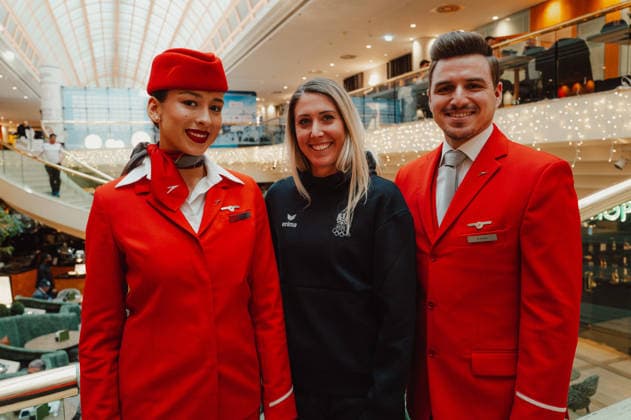 OLYMPICS - Winter Olympic Games, Olympische Spiele, Olympia, OS Milano Cortina 2026 VIENNA,AUSTRIA,26.JAN.26 - OLYMPICS - Winter Olympic Games Milano Cortina 2026, preview, OEOC equipping. Image shows Cornelia Huetter (AUT) and employees of Austrian Airlines.  GEPAxpictures xAlexanderxSolc