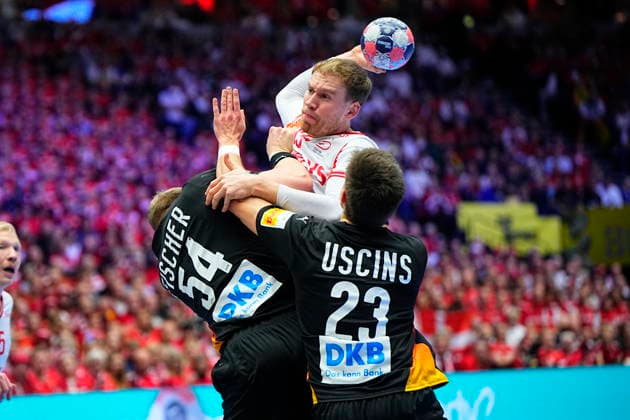 European Men s Handball Championship: Denmark - Germany Germanys Justus Fischer and Renars Uscins defends Denmarks Simon Pytlick during the EHF Euro 2026 main round men s handball match between Denmark and Germany at Jyske Bank Boxen in Herning, Monday, January 26, 2026. (Photo: Bo Amstrup Scanpix 2026) , Herning Denmark Copyright: BoxAmstrupx spdk20260126-204743-L