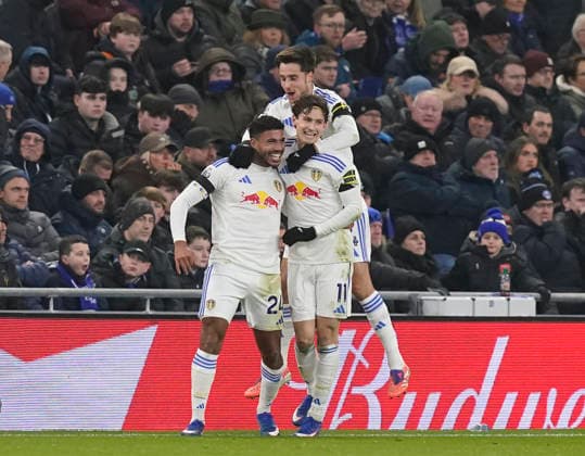 Liverpool, England, 26th January 2026. James Justin of Leeds United (l) celebrates scoring the first goal during the Everton vs Leeds United Premier League match at Hill Dickinson Stadium, Liverpool. Picture credit should read: Andrew Yates Sportimage EDITORIAL USE ONLY. No use with unauthorised audio, video, data, fixture lists, club league logos or live services. Online in-match use limited to 120 images, no video emulation. No use in betting, games or single club league player publications. SPI_034_AY_Everton_Leeds SPI-4481-0034