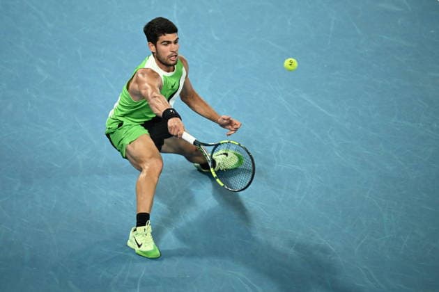 TENNIS AUSTRALIAN OPEN, Carlos Alcaraz of Spain in action during the Men™s quarter final match against Alex de Minaur of Australia on day 10 of the 2026 Australian Open tennis tournament at Melbourne Park in Melbourne, Tuesday, January 27, 2026. ( NO ARCHIVING MELBOURNE VICTORIA AUSTRALIA  Copyright: xJOELxCARRETTx 20260127181892623527