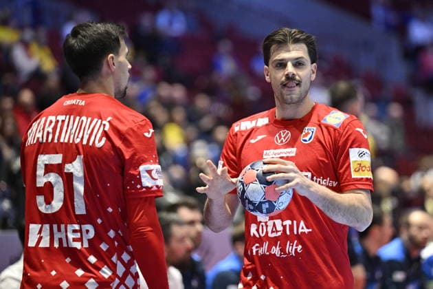 MALMÖ, SVERIGE 20260127 Croatia s Filip Glavas (right) and Ivan Martinovic in action during the 2026 EHF European Men s Handball Championship (the EHF Euro 2026) main round round match between Slovenia and Croatia at Malmö Arena, in Malmö, Sweden, on January 27, 2026. MALMÖ SVERIGE x50090x