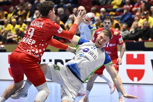 MALMÖ, SWEDEN 20260127 Croatia s Luka Lovre Klarica (9) and Slovenia s Kristjan Horzen in action during the 2026 EHF European Men s Handball Championship (the EHF Euro 2026) main round match between Slovenia and Croatia at Malmö Arena, in Malmö, Sweden, on January 27, 2026. MALMÖ SWEDEN x50090x