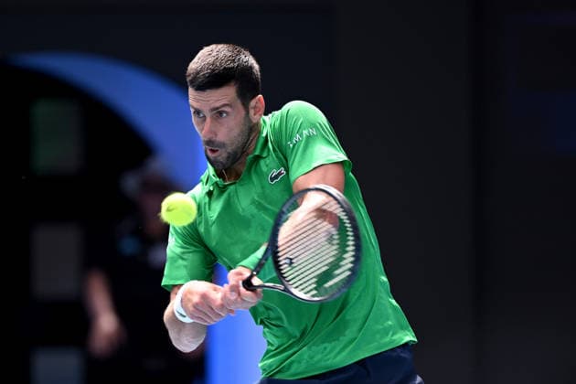 TENNIS AUSTRALIAN OPEN, Novak Djokovic of Serbia in action during the men™s quarterfinals against Lorenzo Musetti of Italy on day 11 of the 2026 Australian Open tennis tournament at Melbourne Park in Melbourne, Wednesday, January 22, 2026. ( NO ARCHIVING MELBOURNE VICTORIA AUSTRALIA  Copyright: xJAMESxROSSx 20260128151260934799