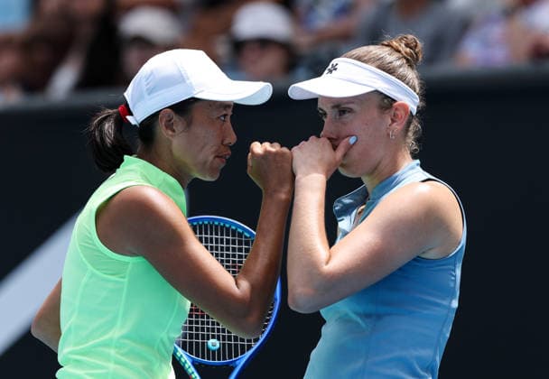 (260128) -- MELBOURNE, Jan. 28, 2026 -- Zhang Shuai (L) Elise Mertens communicate during the women s doubles quarterfinal match between Zhang Shuai (China) Elise Mertens (Belgium) and Wu Fang-Hsien (Chinese Taipei) Hozumi Eri (Japan) at the Australian Open tennis tournament in Melbourne, Australia, Jan. 28, 2026. ) (SP)AUSTRALIA-MELBOURNE-TENNIS-AUSTRALIAN OPEN-WOMEN S DOUBLES-QUARTERFINALS MaxPing 