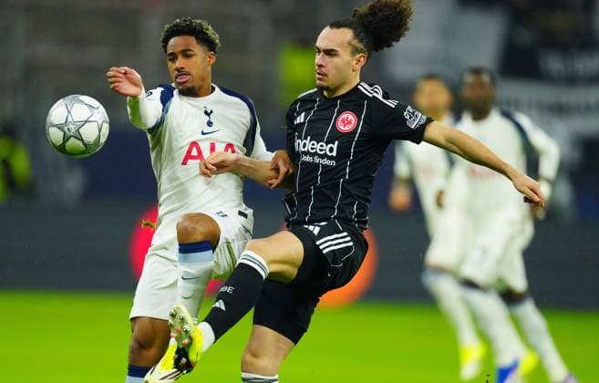 Wilson Odobert of Tottenham Hotspur battles with Arthur Theate of Eintracht Frankfurt Eintracht Frankfurt v Tottenham Hotspur, UEFA Champions League, Group Stage, Football, Deutsche Bank Park, Frankfurt, Germany - 28 Jan 2026Frankfurt Deutsche Bank Park Germany EDITORIAL USE ONLY No use with unauthorised audio, video, data, fixture lists, club league logos or live services. Online in-match use limited to 120 images, no video emulation. No use in betting, games or single club league player publications. Copyright: xJavierxGarcia Shutterstockx 16429470n