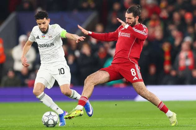 Abdellah Zoubir of Qarabag and Dominik Szoboszlai of Liverpool Liverpool v Qarabag, UEFA Champions League, Group Stage, Football, Anfield, Liverpool, UK - 28 Jan 2026Liverpool Anfield United Kingdom EDITORIAL USE ONLY No use with unauthorised audio, video, data, fixture lists, club league logos or live services. Online in-match use limited to 120 images, no video emulation. No use in betting, games or single club league player publications. Copyright: xPaulxCurrie Shutterstockx 16429492o