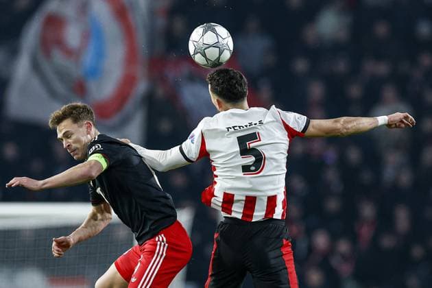 EINDHOVEN , 28-01-2026 , Philips Stadium , season 2025 2026 , UEFA Champions League football , League phase matchday 8 , match between PSV and Bayern Munchen , picture shows Bayern Munchen player Joshua Kimmich and PSV player Ivan Perisic PSV - Bayern Munchen  x201144409x Copyright: