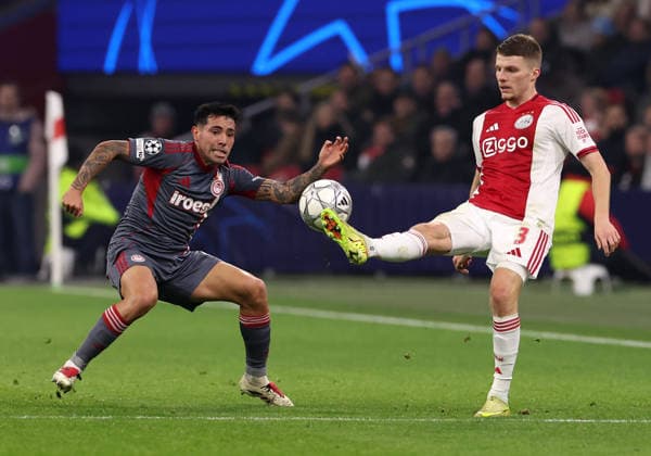 Anton Gaaei of AFC Ajax with Francis Ortega of Olympiakos Piraeus during the match AFC Ajax Amsterdam vs Olympiacos Piraues at the Johan Cruijff ArenA for the UEFA Champions League season 2025-2026 in AMSTERDAM, Netherlands on 28 january 2026 -