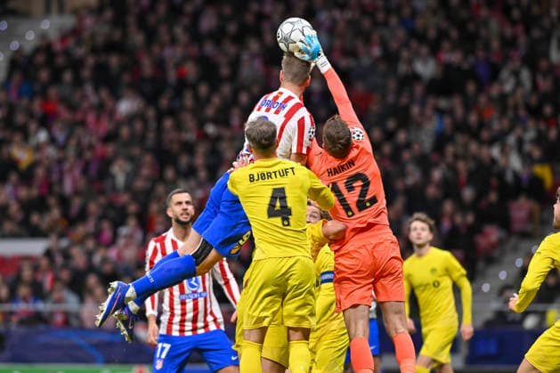 January 28, 2026, Madrid, Madrid, Spain: NIKITA HAIKIN of F. K. Bodo Glimt and ALEXANDER SoËœRLOTH of Atletico de Madrid in action during the Champions League match, league match 8 between ATLETICO DE MADRID and F. K. BODO GLIMT, held on January 28, 2026, at the Riad Air Metropolitano, Madrid, Spain. Madrid Spain - ZUMAc312 20260128_zsp_c312_019 Copyright: xOscarxManuelxSanchezx