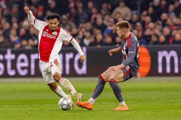 2026-01-28 AFC Ajax v Olympiacos FC - UEFA Champions League AMSTERDAM, NETHERLANDS - JANUARY 28: Owen Wijndal of AFC Ajax, Costinha of Olympiacos FC during the UEFA Champions League match between AFC Ajax and Olympiacos FC at Johan Cruijff ArenA on January 28, 2026 in Amsterdam, Netherlands. Amsterdam Johan Cruijff ArenA Netherlands Content not available for redistribution in The Netherlands directly or indirectly through any third parties. Copyright: xBenxGalx