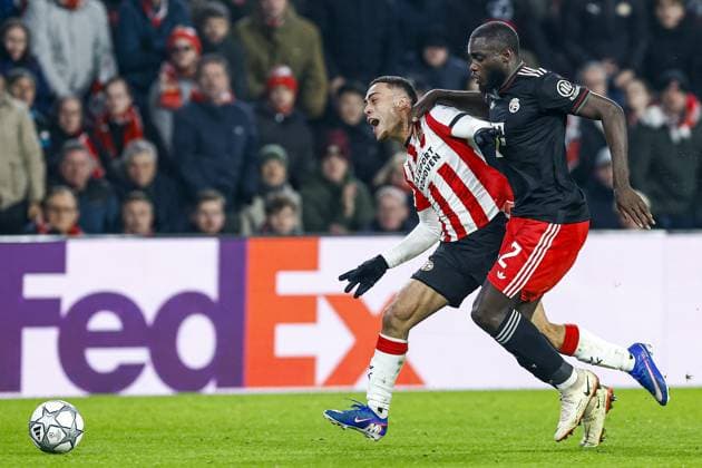 EINDHOVEN , 28-01-2026 , Philips Stadium , season 2025 2026 , UEFA Champions League football , League phase matchday 8 , match between PSV and Bayern Munchen , picture shows PSV player Sergino Dest and Bayern Munchen player Dayot Upamecano PSV - Bayern Munchen  x201145538x Copyright: