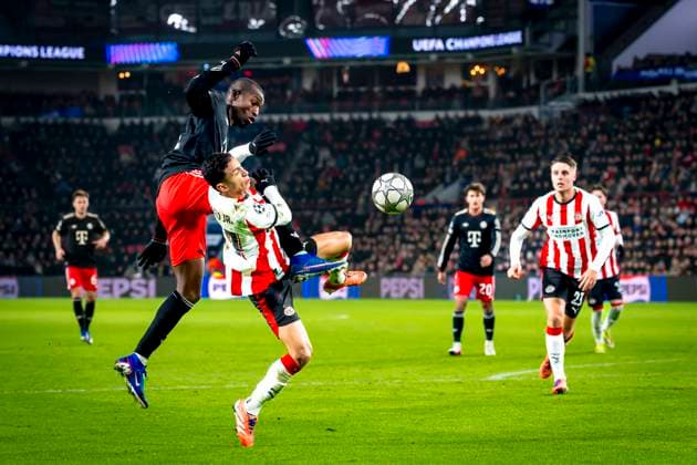 SC Bayern Munchen forwarder Nicolas Jackson, PSV Eindhoven defender Mauro Jï¿½nior during the match PSV Eindhoven vs FC Bayern Munchen at the Philips stadium for the Champions League - League phase - Matchday 8 season 2025-2026 in EINDHOVEN, Netherlands on 28 01 2026, (Photo by Marcel van Dorst EYE4IMAGES) -