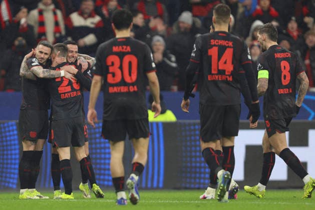 Alejandro Grimaldo (Bayer 04 Leverkusen) celebrates after scoring his team s third goal with teammates during the UEFA Champions League 2025 26 League Phase MD8 match between Bayer 04 Leverkusen and Villarreal CF at BayArena on January 28, 2026 in Leverkusen, Germany. (Photo by Oliver Kaelke DeFodi Images) -