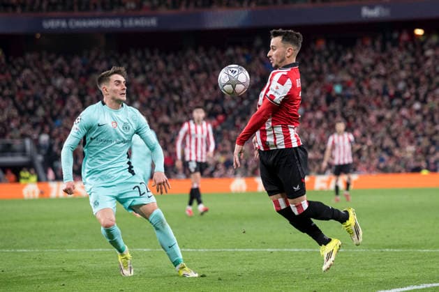 UEFA Champions League Athletic Club vs Sporting Clube de Portugal Alex Berenguer of Athletic Club attempt to hold possession whilst under pressure from Ivan Fresneda of Sporting Clube de Portugal during Champions League 2025-26 League phase match between Athletic Club and Sporting Clube de Portugal at San mames stadium. Bilbo (Basque Country). January 28, 2026. (Gari Garaialde Bostok Photo) Bilbao Bizkaia Spain Editorial Use Only  Copyright: xGarikoitzxGaraialdex xBostokxPhotox Bostok Photo GarixGaraialdex GG2601280492