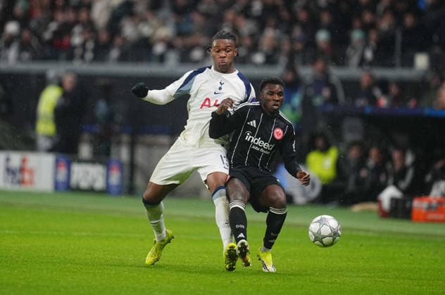 Destiny Udogie (Tottenham Hotspur) and Aurelio Buta (Eintracht Frankfurt) battle for the ball the UEFA Champions League 2025 26 League Phase match between Eintracht Frankfurt and Tottenham Hotspur, Deutsche Bank Arena on January 28, 2026 in Frankfurt, Germany. (Photo by Thor Wegner DeFodi Images) -