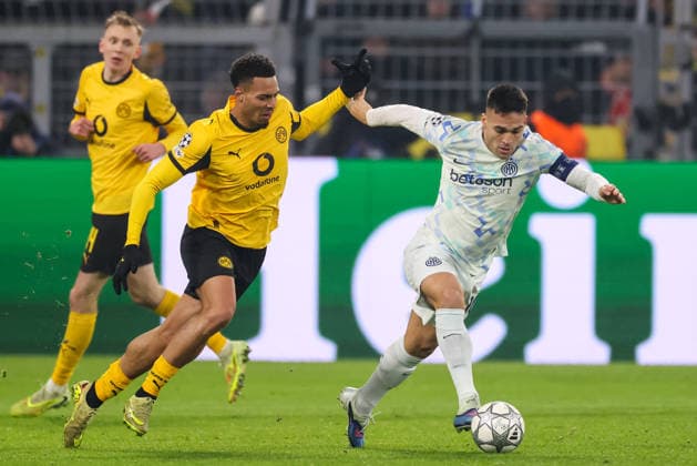 DORTMUND, GERMANY - JANUARY 28: Felix Nmecha of Borussia Dortmund challenges Lautaro Martinez of FC Internazionale during the UEFA Champions League 2025 26 League Phase MD8 match between Borussia Dortmund and FC Internazionale Milano at BVB Stadion Dortmund on January 28, 2026 in Dortmund, Germany. (Photo by Rene Nijhuis) SPO  Copyright: xRenexNijhuis